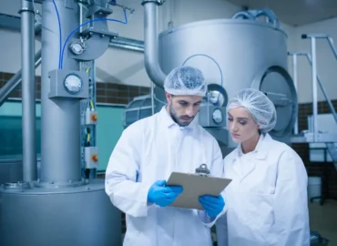 Copy of Food technicians working together in a food processing plant-1